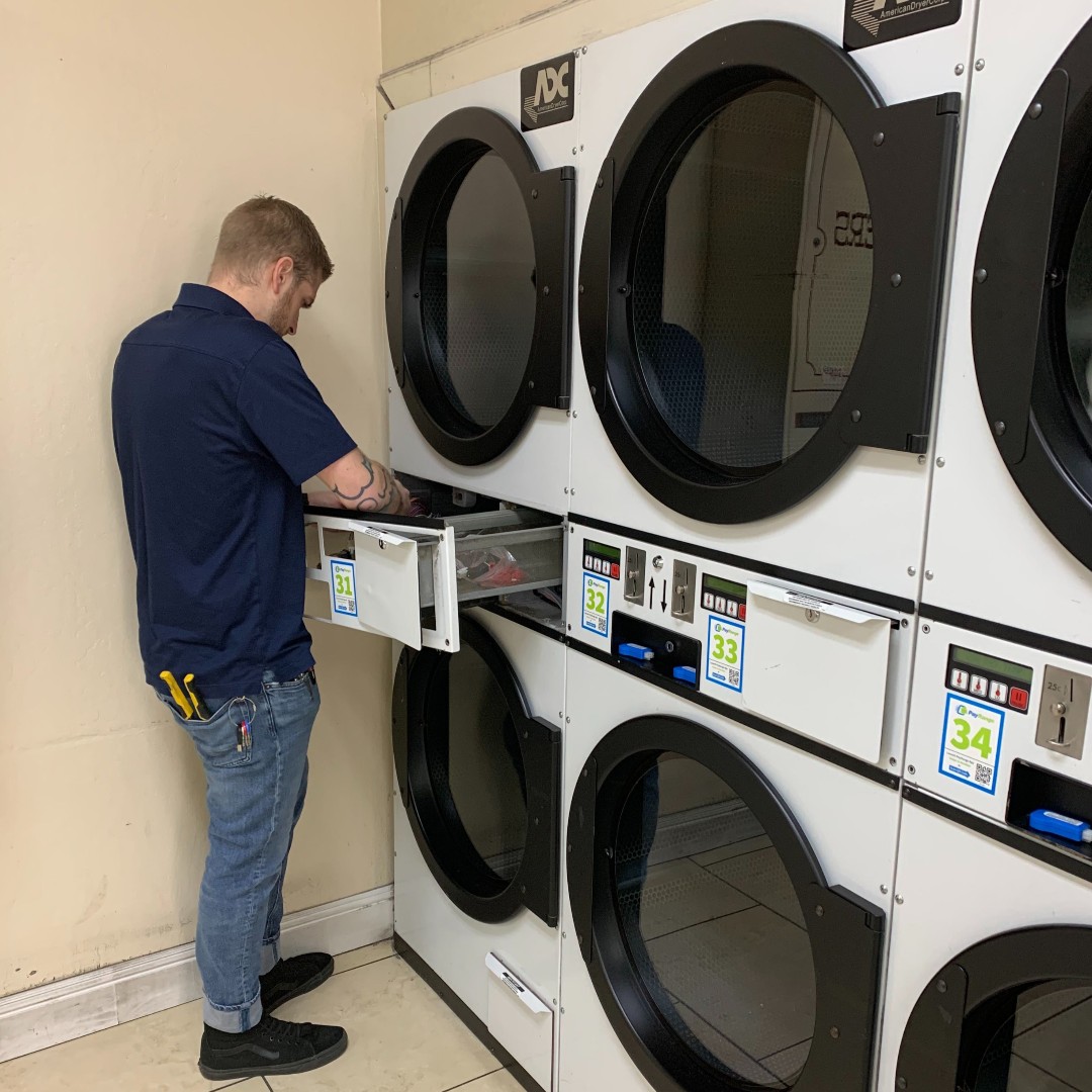 Our employee Hans professionally installing BluKey devices in a #laundromat in Southern California today. Four hours brings any laundromat into the mobile era. #turnkey #mobilepayment
