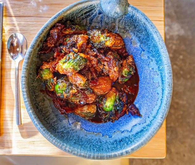 Crispy Fried Brussels Sprouts tossed with bacon, maple syrup &amp; house made chili sauce! 🤤🤤🤤

#EatINW #TheWanderingTable #BrusselSprouts #INW
