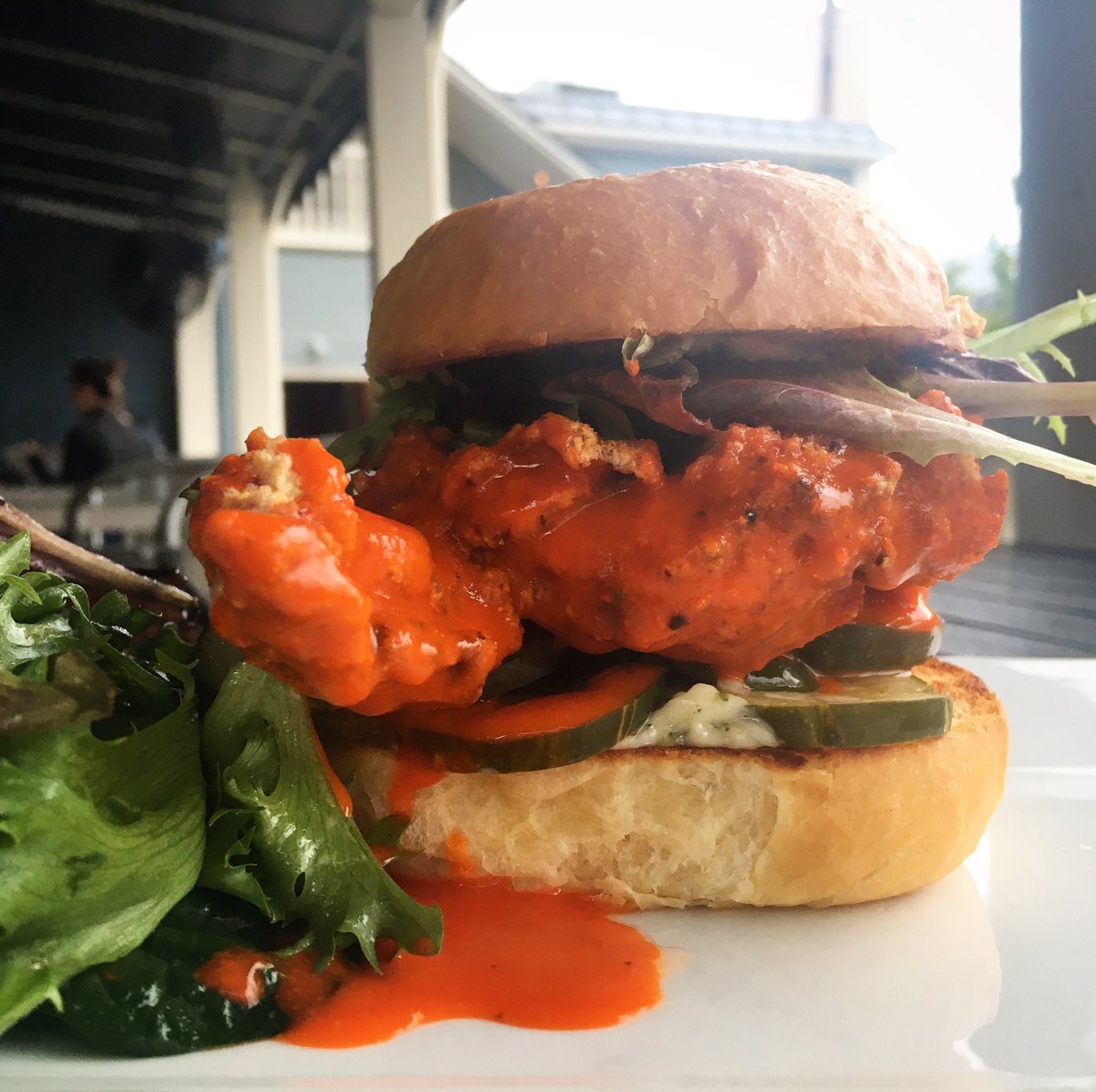 Our hot chicken sandwich is definitely a crowd pleaser! Cool it down with an extra side of our cilantro ranch dressing! 🔥🍗 #rva #rvadine #rvachickensandwich #postbellumrva #hotchicken