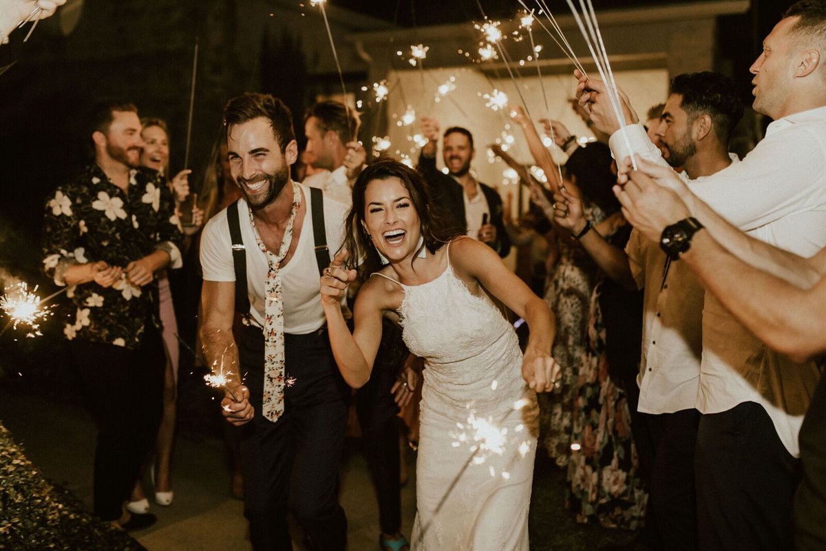 Every exit is so different and unique. You really see the personalities of the couple as they walk down the aisle. 

Venue: Vintage Villas Hotel and Events 
Photographer: Rebecca Taylor Parks