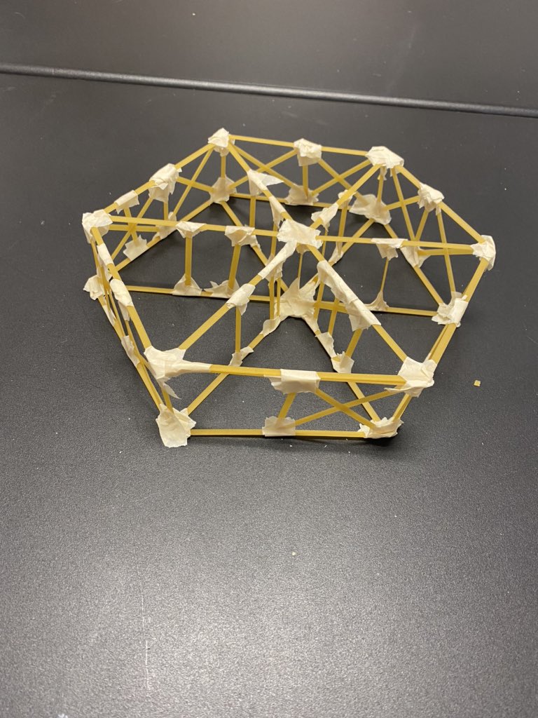 LSMscience's tweet photo. My physics students built structures out of fettuccine and masking tape to see how design impacts how much force it can withstand. Record today was 19 books. #iteachphysics #stem https://t.co/r7wBv95uYD