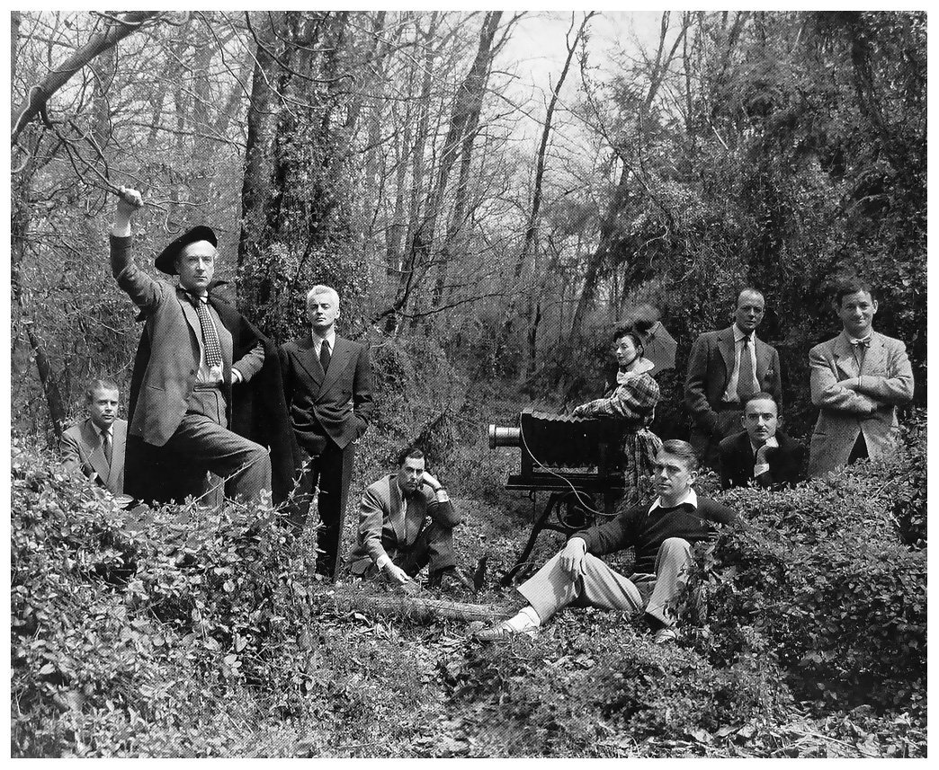 Irving Penn's shot of Vogue photographers at Locust Valley NY, 1947. He's sitting up frontLeft to right: Serge Balkin, Cecil Beaton, George Platt Lynes, Constantine Joffe, Horst P. Horst, John Rawlings, Alexander Liberman, Erwin BlumenfeldThe only woman is Dorian Leigh, a model