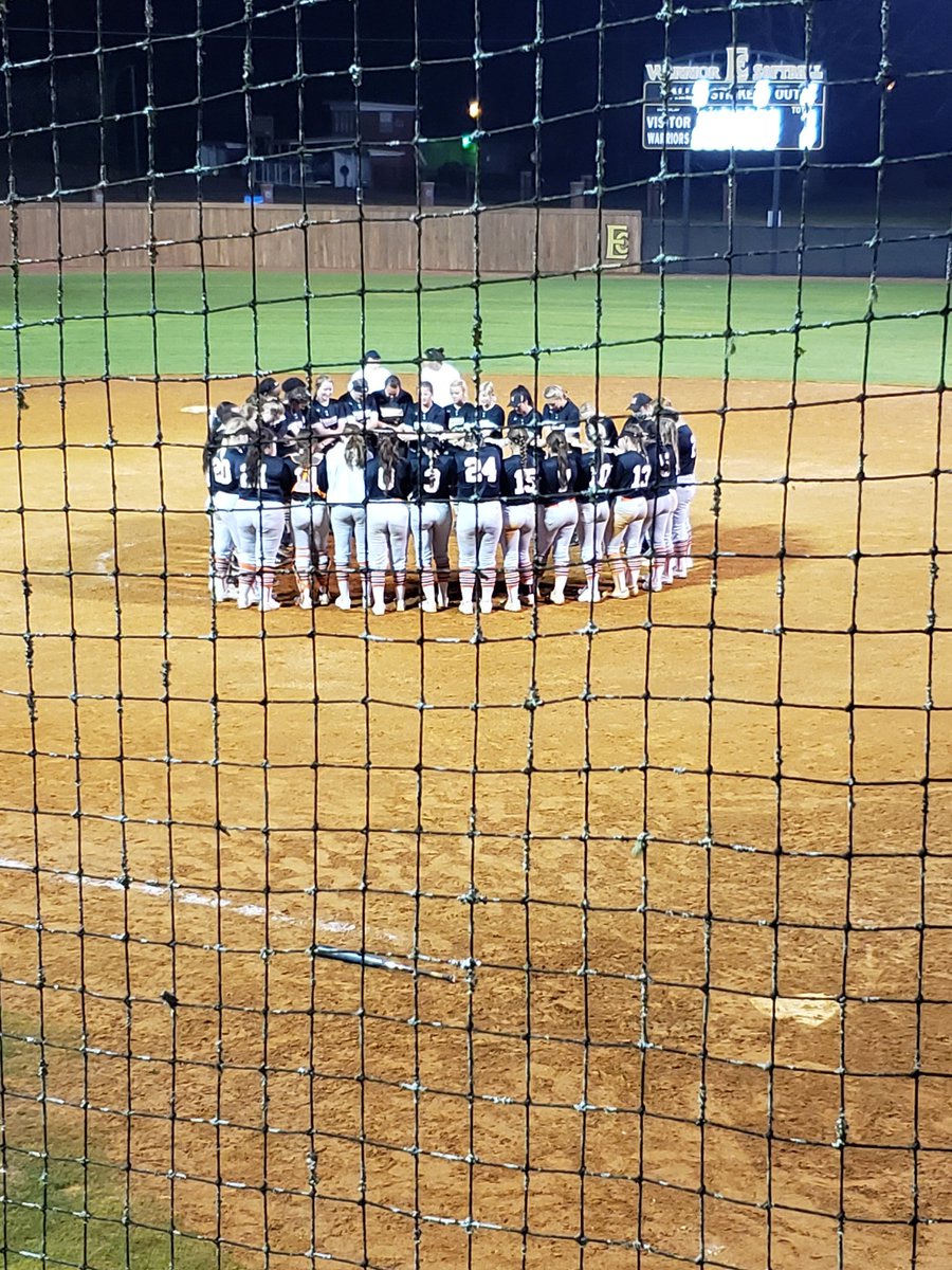 CoachPN's tweet photo. This is what it's all about! After the @Mmitigerssoftba Lady Tigers and the @ECCCSoftball Lady Warriors battled on the field for 6 hours in their 5th & 6th meetings of the season, they came together to give thanks for the opportunity to play this great game of fastpitch softball. https://t.co/KBHZseXerK