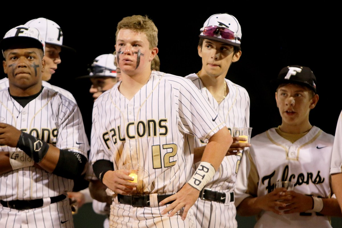 Duns_more's tweet photo. After the game, the Foster baseball team (@fosterfalcon) had a candlelight vigil on the mound to remember and honor their fallen teammate Sam Brown, his brother Hayes and mother Lynnette. https://t.co/tAhBETSp9o