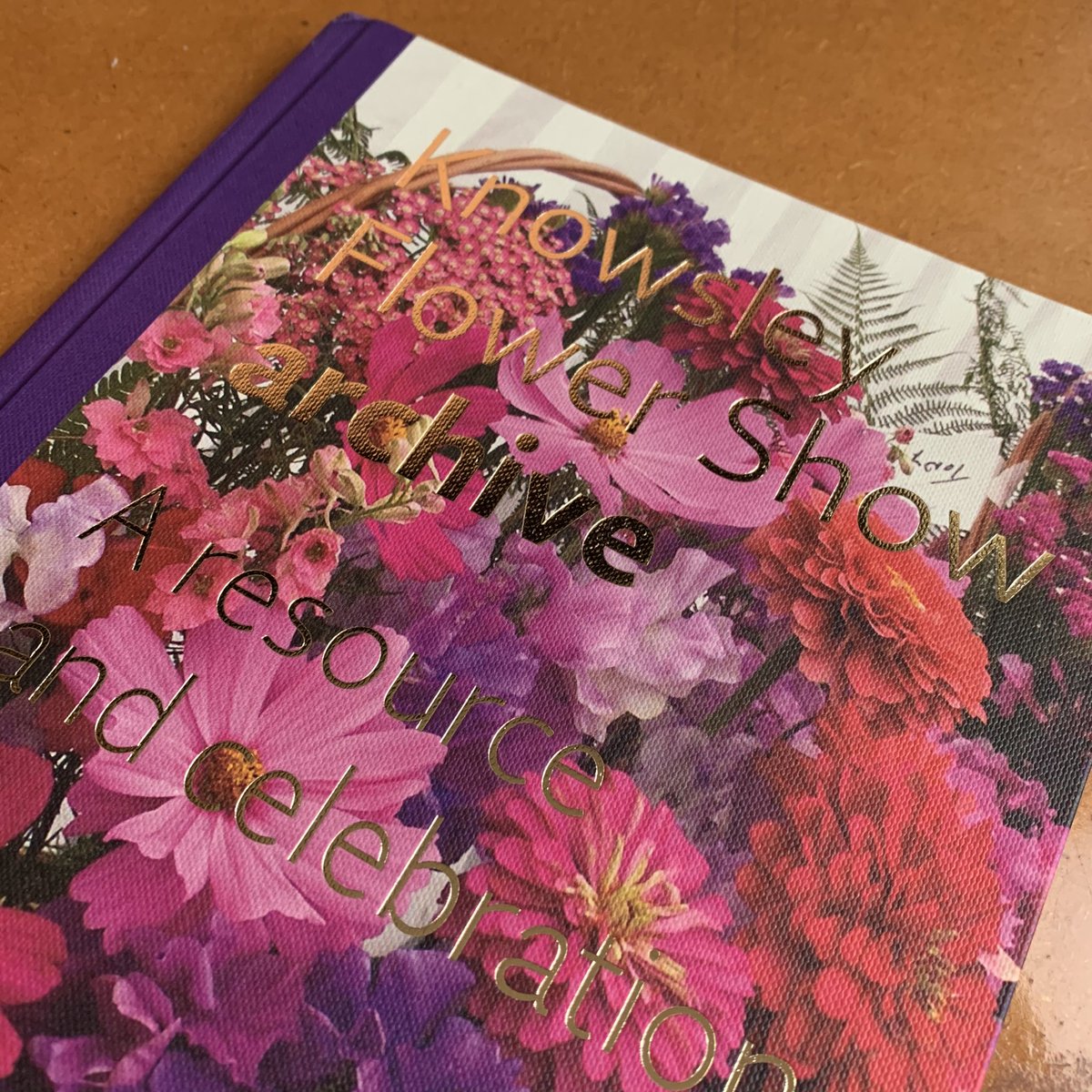AXIS_DESIGN's tweet photo. Lovely book project completed for Knowsley Flower Show Archive - a heritage lottery funded project with @SimonGrennan_ - launch sadly delayed for obv reasons - printed by @gomerprinting cover on #Wibalin with a lush foil blocking @JaneTCrowther @WinterandCoUK https://t.co/vEtvqYsVvX