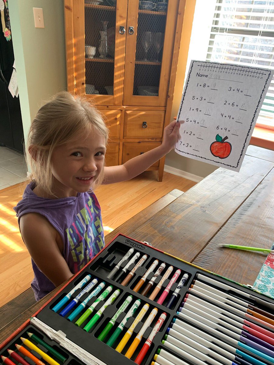 Love getting pictures of my kinder kids working on their work at home. I sure miss these faces!