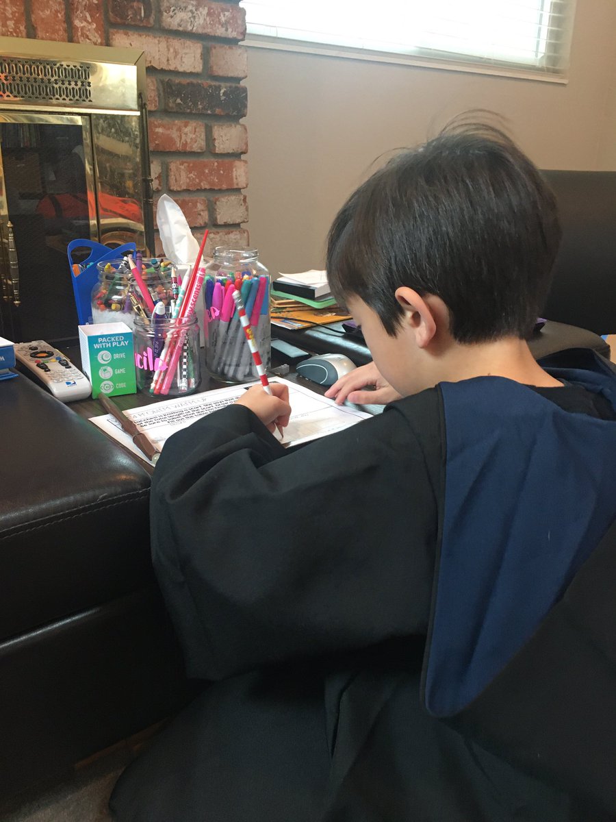 Serena17's tweet photo. @JohnBaldwinElem @amberpott13 Doing worksheets in a Hogwarts robe makes distance learning feel more magical https://t.co/WbAJ1PAFFn