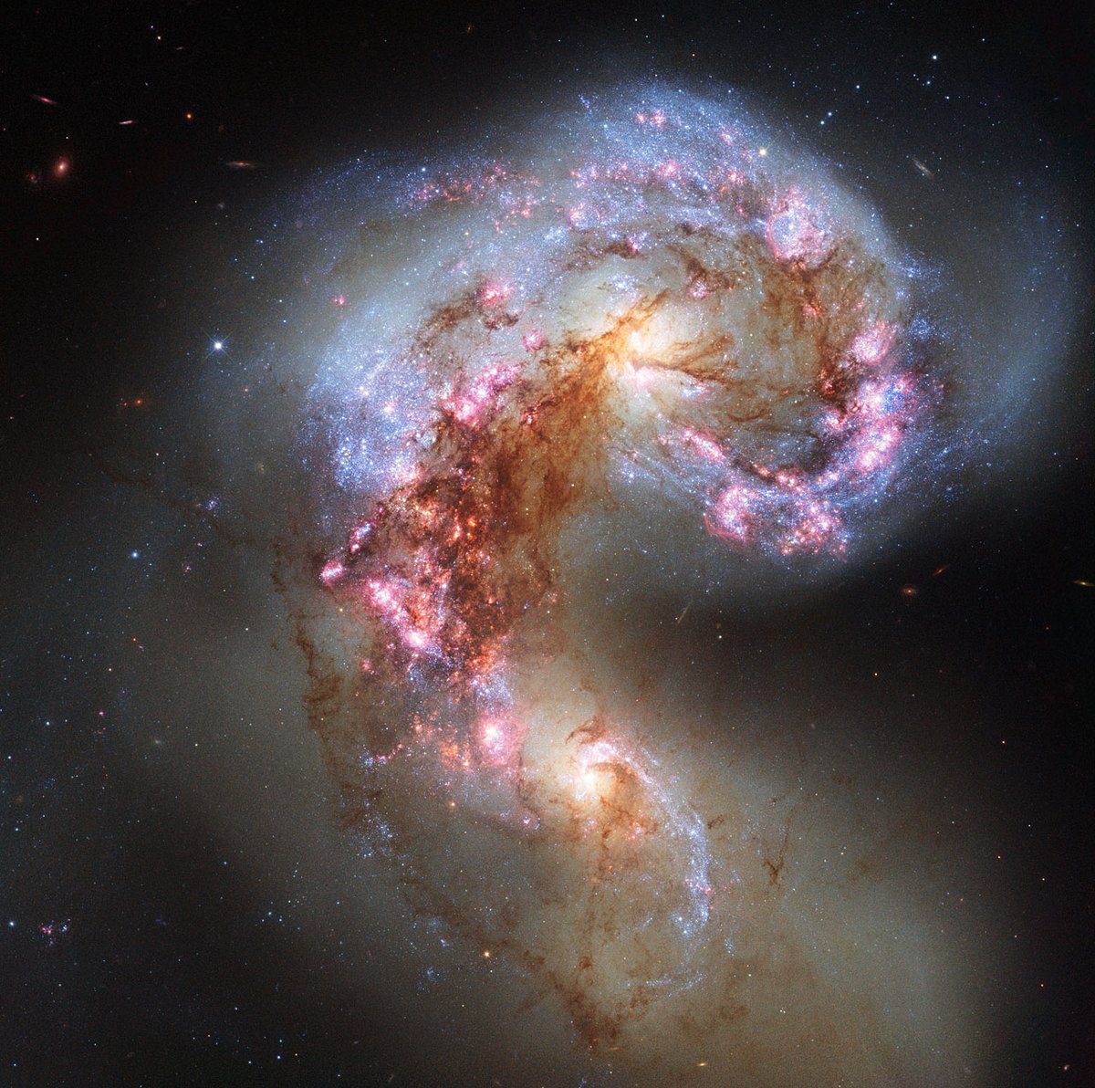 Former spiral galaxies NGC 4038 and NGC 4039 –– the Antennae Galaxies –– are a few hundred million years into a merger that will result in a single, elliptical galaxy.ImageL: ESA/Hubble & NASA
