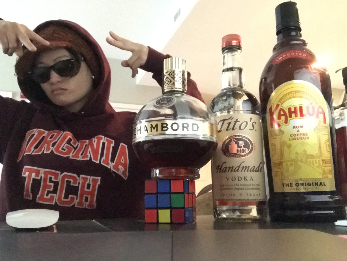 BarkleyREI's tweet photo. Today in BarkleyREI's Social Distancing Spirit Week the category is College 🎓 and Visual Designer Michelle Claud is serving that dorm life realness. Congratulations on winning the day, Michelle👏Here's to hoping your Finals go down smoother than that Tito's! https://t.co/ZWggapZ3s3