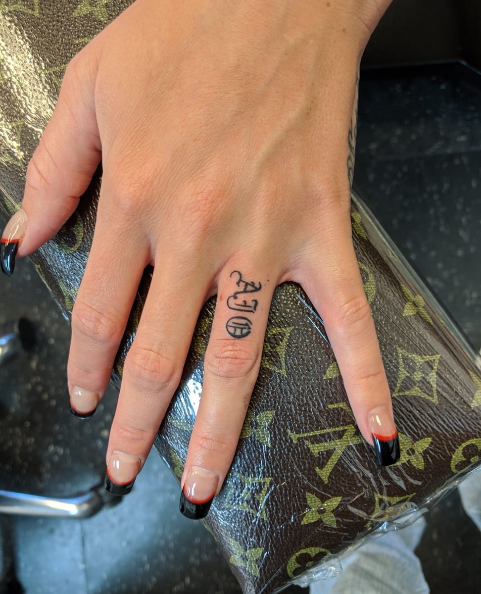 Love Louis Vuitton finger tats  Knuckle tattoos, Finger tattoo designs,  Cool finger tattoos