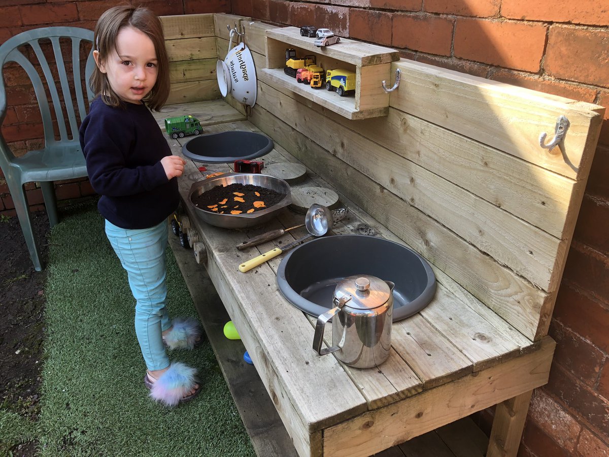 Fortunately, kids don’t understand what’s happening. Here’s my little girl making a mud pie on one of our mud kitchens #mudpie #messyplay #homelearning #HomeLearningUK #mudkitchen