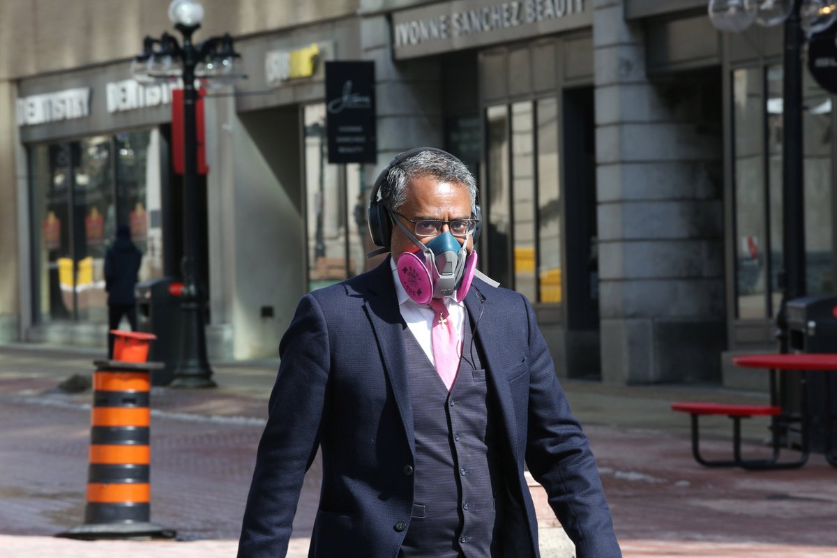 @davechanmanFrom March 17, a pedestrian wearing a mask make his way down Sparks street in Ottawa.