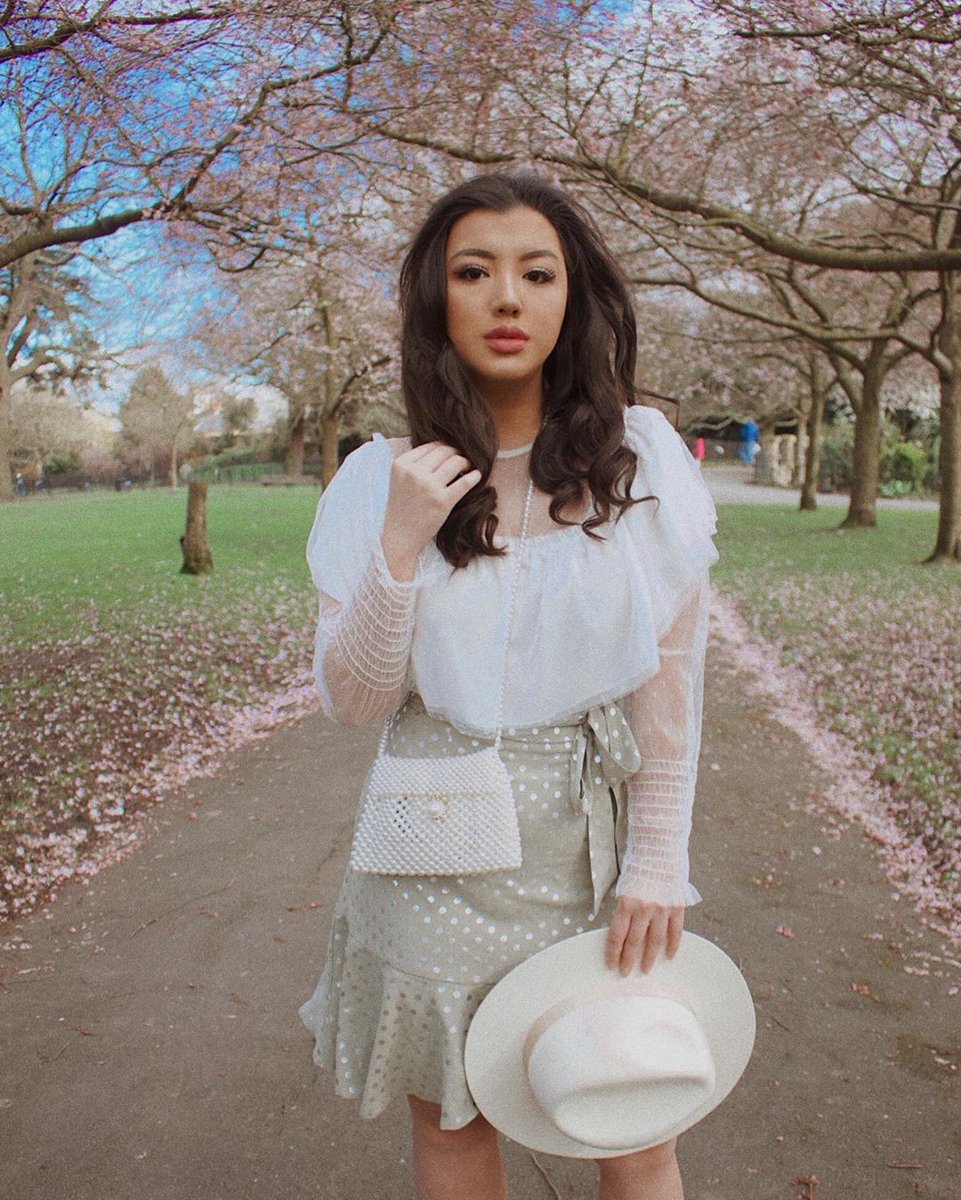 How unreal does @charmainehungsm look wearing our polka dot mini skirt? 😍 We're obsessed with the colour of the moment: sage green. Tap to shop! #MyANGELEYE