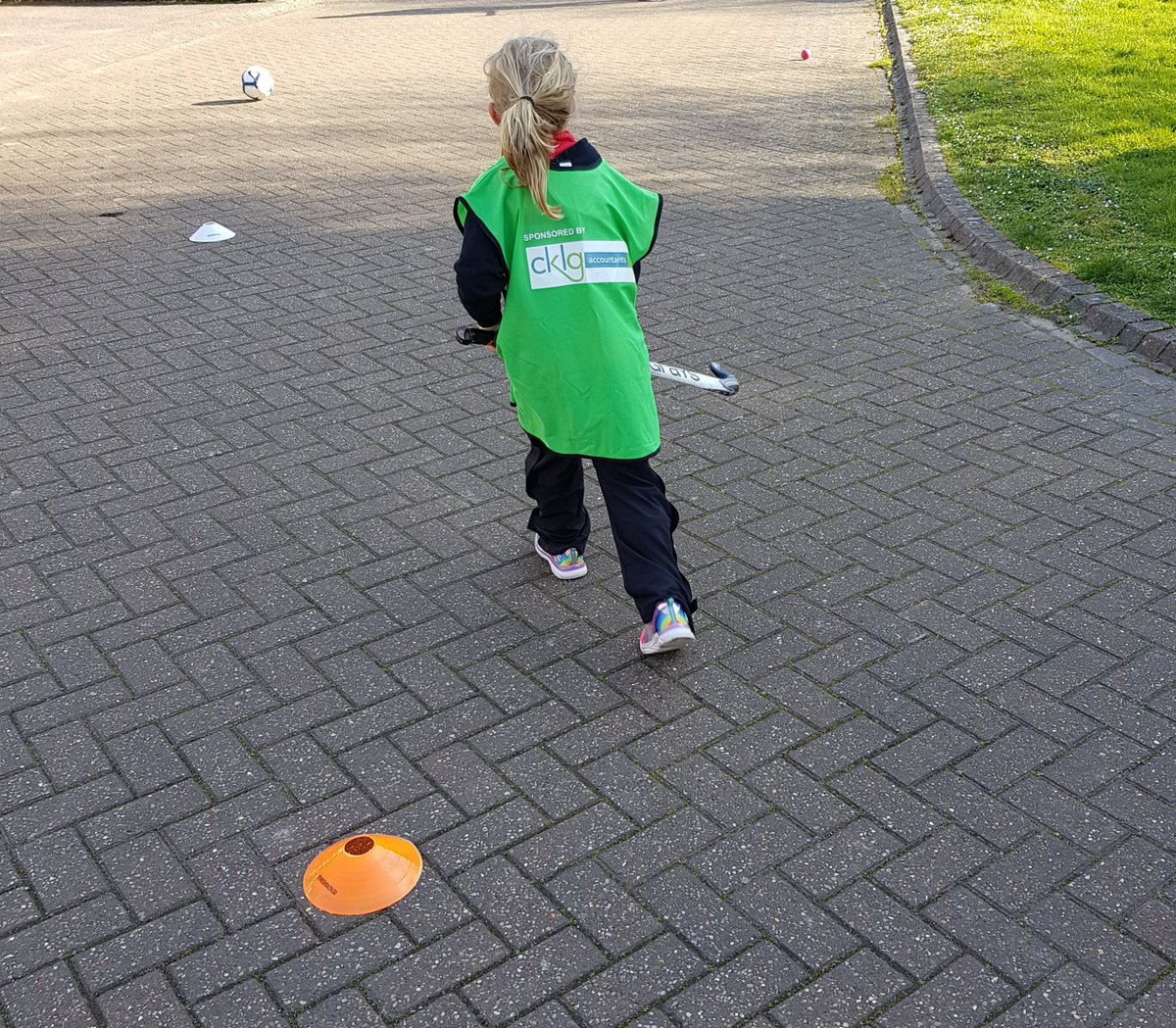 FcaStef's tweet photo. First lesson of the day and she insisted on playing hockey 🏑 @NewmarketHC. It wouldn't be complete without a @CKLGAccountants  bib! https://t.co/zzd1CYiXTW