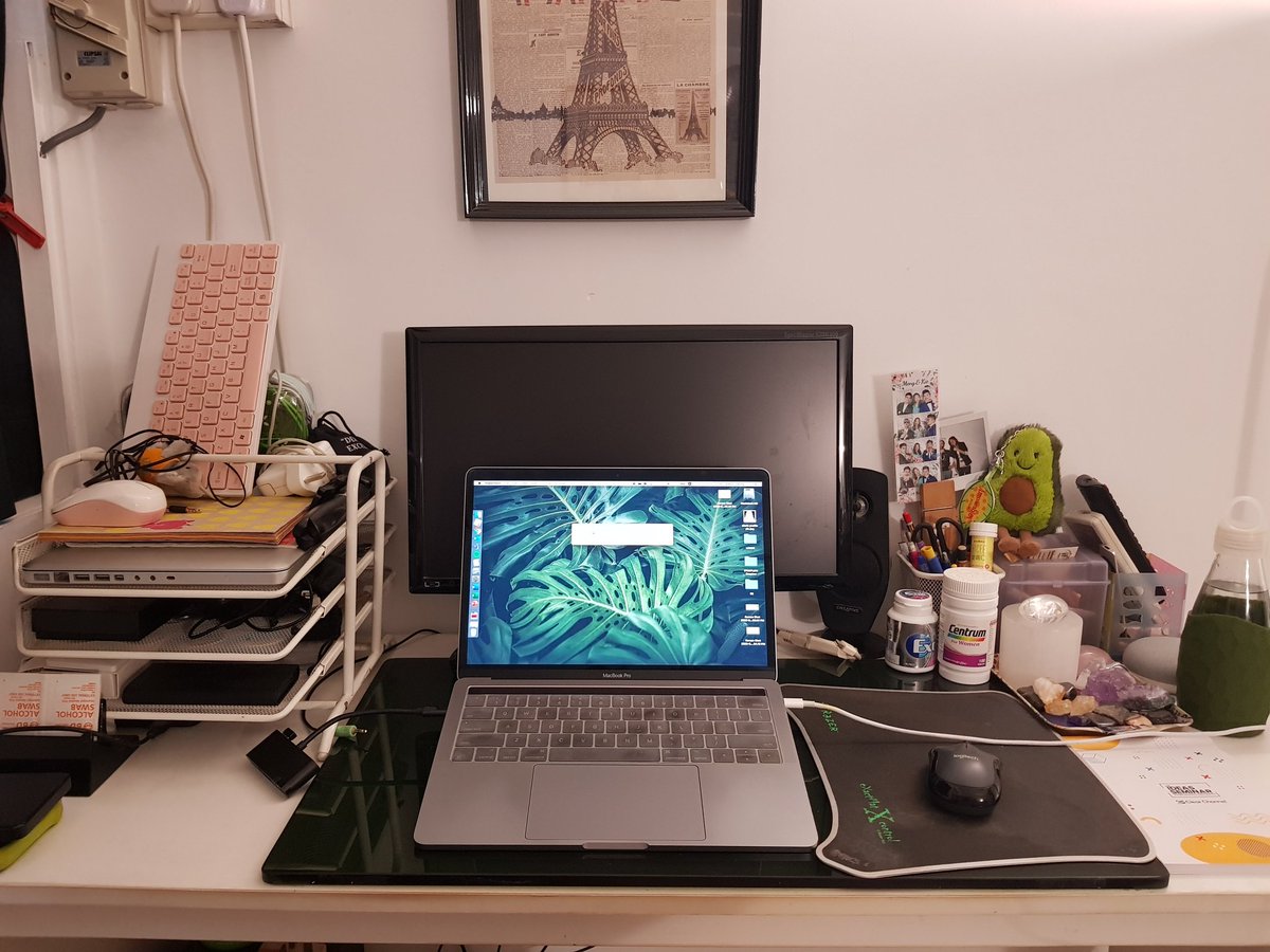 alexischeong's tweet photo. My #workfromhomedesk including a hanging sharepoint pptx. Not pictured, my other macbook air. Also waiting for monitor usb-c adapter so i can connect it... https://t.co/dtyOjLBNvP