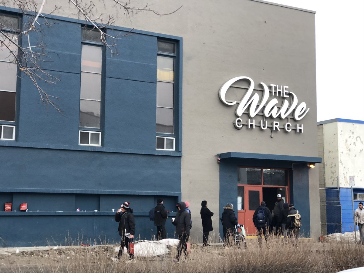 AlexBrownYXE's tweet photo. The need is still great at @AgapeTable, virus or not. They just opened for breakfast at 8AM and there has been a consistent line here on Furby St. According to their website, “every $1 YOU donate puts $15 of food on Agape’s tables”. @CTVMorningWPG https://t.co/HvkGcAXTB4
