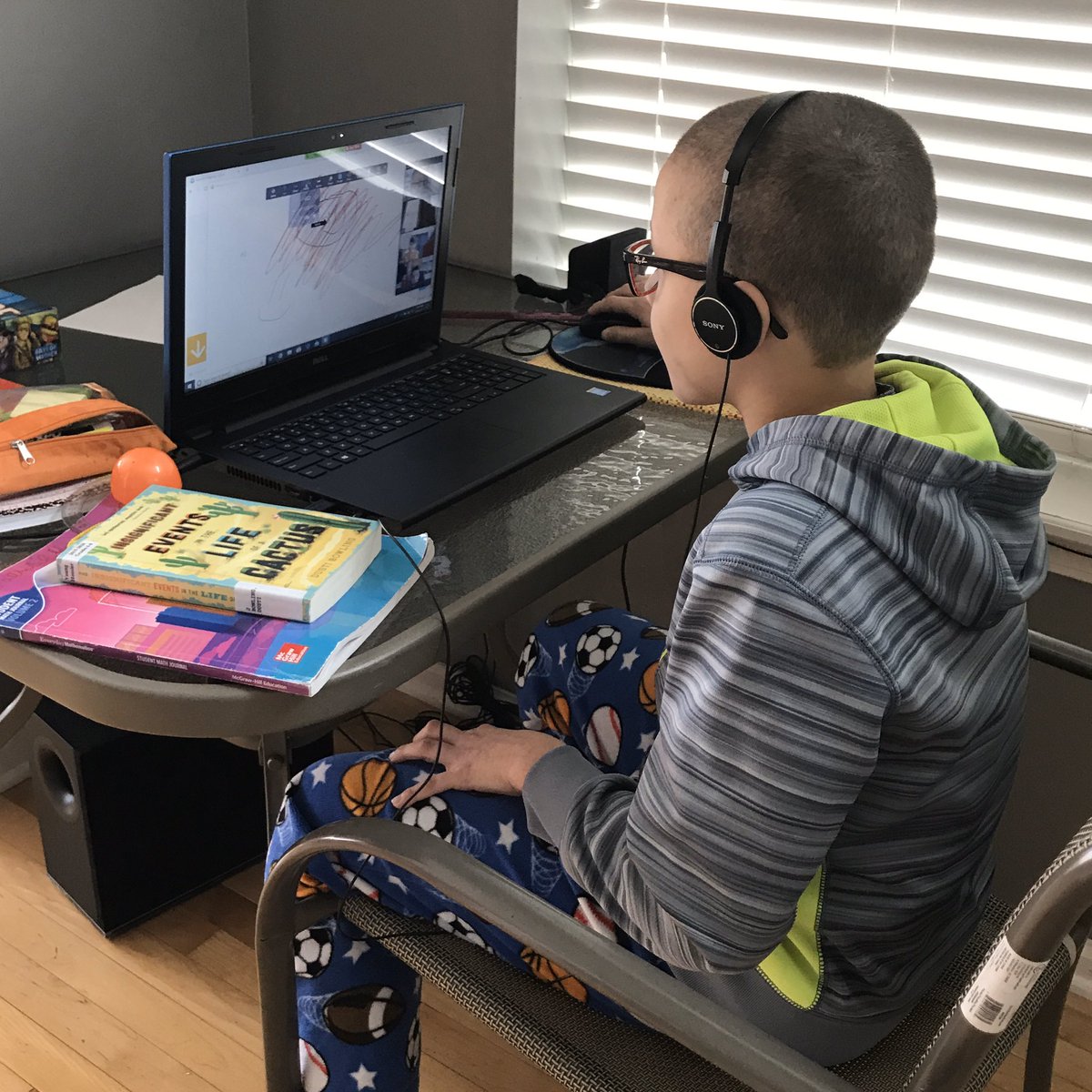 In contact with his teacher and classmates via videoconference and enjoying PJ day #smokyrowathome <a href="/SmokyRow1/">Smoky Row Elementary</a> <a href="/GerthGrade4/">Gerth's Rockets Rock</a> <a href="/myccs/">Carmel Clay Schools</a>
