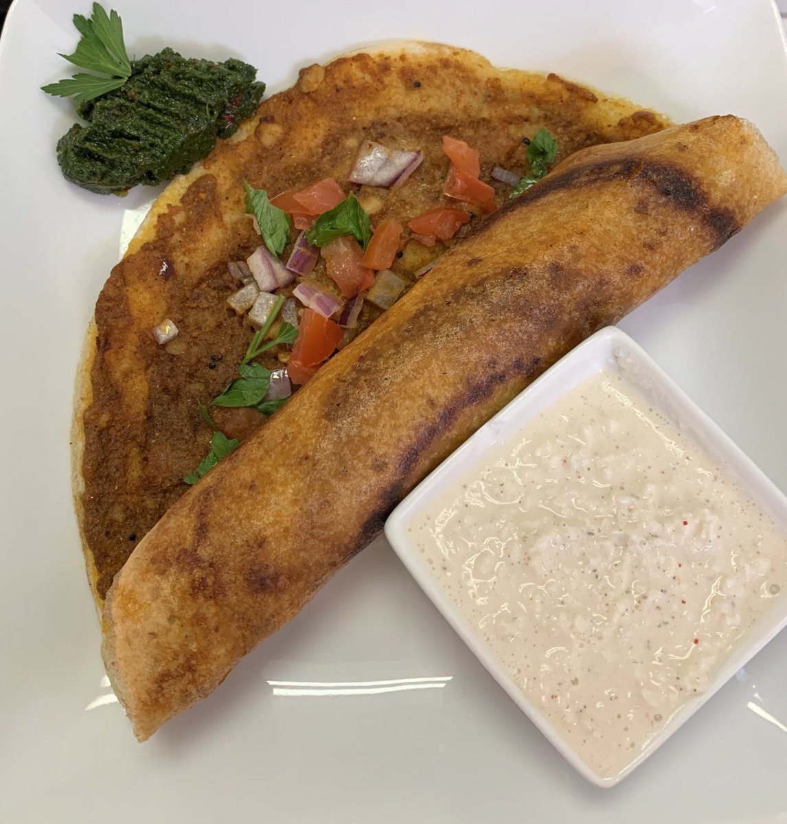 Dosa with desiccated coconut and parsley cilantro chutney