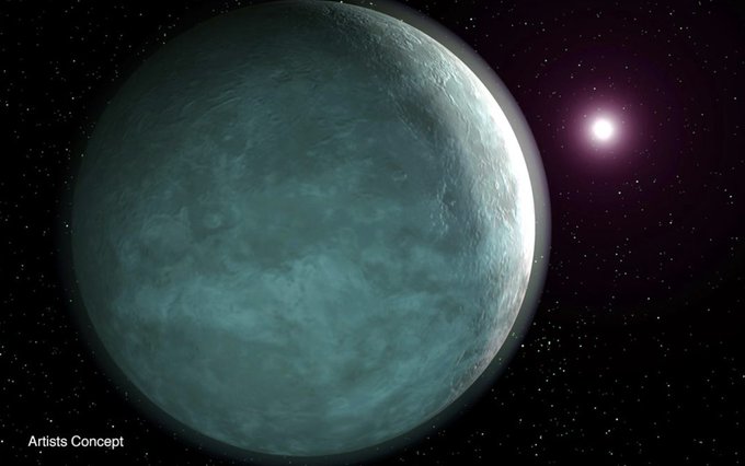 A large, blueish planet is seen well beyond its star in the black of space in an artist's rendering.
