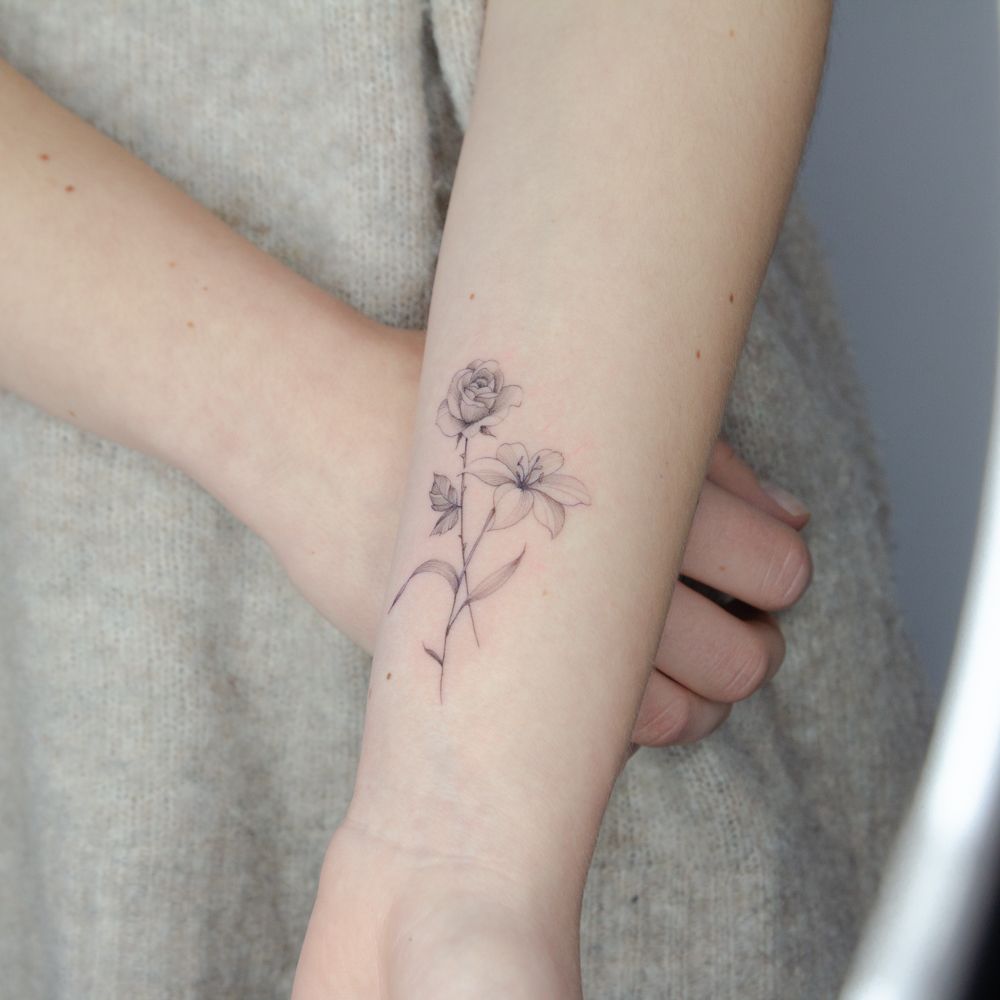 30 Best Lily Tattoos and Their Meanings  Saved Tattoo