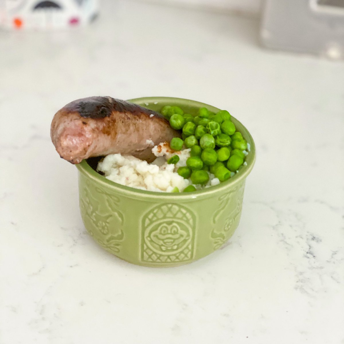Across the pond for DQFF today!Mr. Toad’s Bangers and Mash with a side of sweet peas. Souvenir dish available.