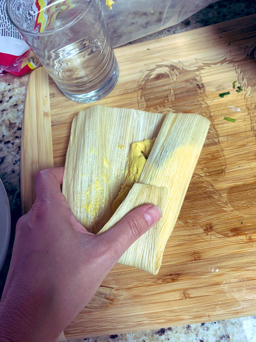 Other main points. Those corn husks need to be soaked for real or they rip. Roll the tamales so the corn rolls all the way around the filling. You can use the husk like a sushi rolling mat, which yeah, culture clash, but I grab from everywhere when I cook.