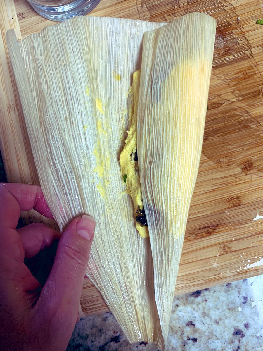 So. I don’t do this the right way! I do this the way that works for me and keeps me from making a tamale frustration roar. Main points: use enough masa to cover an area, like peanut butter thickly spread. Now some cheese. And a little filling in the middle. Roll it like sushi.