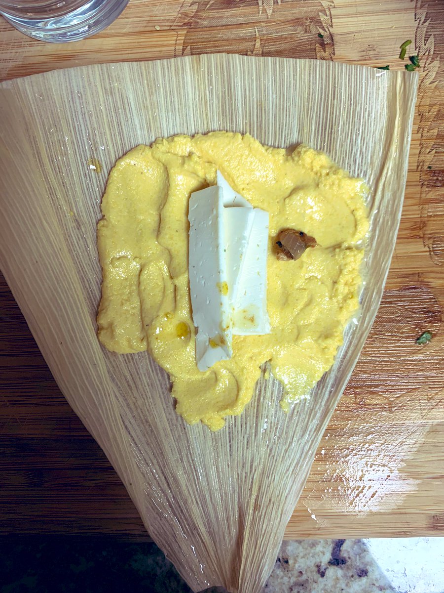 So. I don’t do this the right way! I do this the way that works for me and keeps me from making a tamale frustration roar. Main points: use enough masa to cover an area, like peanut butter thickly spread. Now some cheese. And a little filling in the middle. Roll it like sushi.