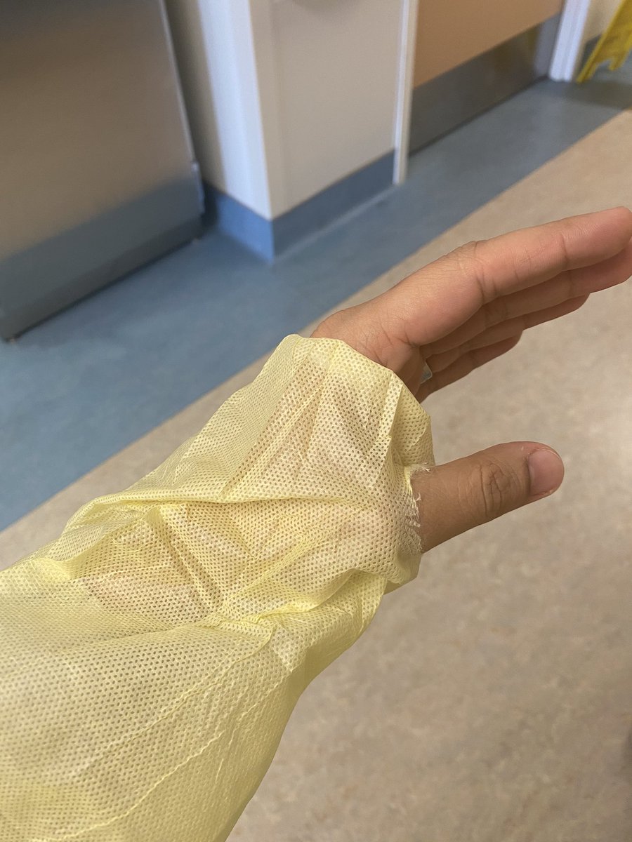 A #PPE hack for those not used to wearing them too often. For disposal gowns, to prevent riding up and exposure of wrist, poke a hole with your thumb. Gloves on top. #COVID2019 @THP_hospital