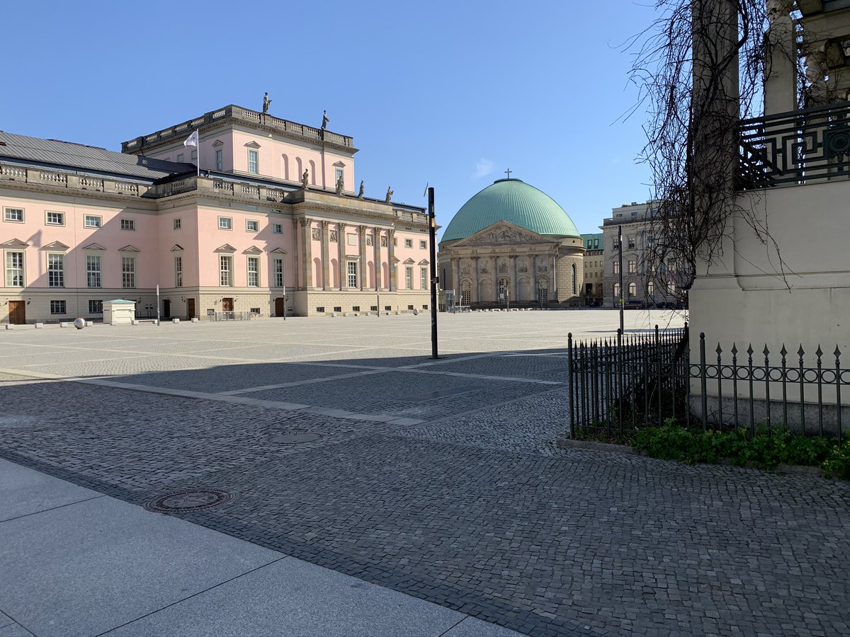 Continuing the theme -- here's Bebelplatz, population zero. Lots of reminders here -- bullet and shrapnel scars in the buildings, window into the memorial to Nazi book burnings -- that this place has been emptied for reasons even more terrifying