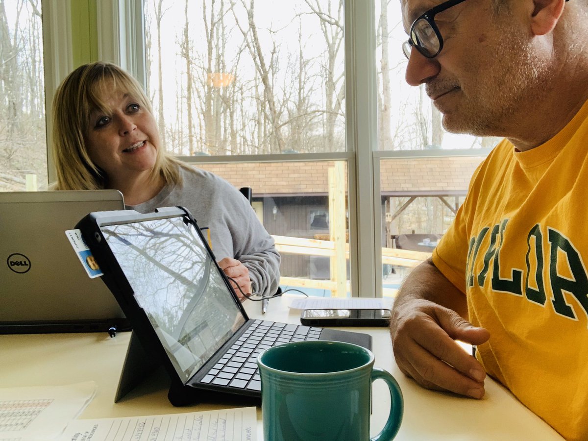 LaDawnOfTime's tweet photo. Day 1 and 2 of working at home sharing office/dining room table with this guy right here!  Maybe he will let me get day 3 photo before he sends me to my room. @WorkatWVU https://t.co/oTy5jfEQzY