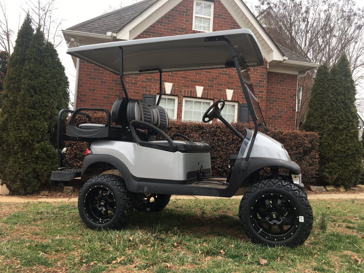 TwistedTreads's tweet photo. Club Car Precedent Golf Cart with a 6” SGC a-arm lift kit, silver body, 80” extended top, tinted windshield, extreme deluxe seat cushions, new rear seat kit, 14” black rims and 23” off road tires.   You pick the colors and we will custom build anything you want! #LKN https://t.co/a5wzO9XfFy