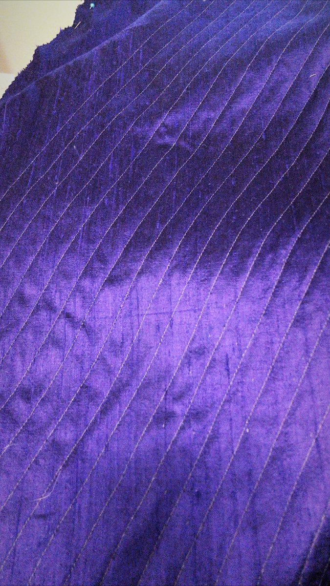 quilting is GO, I did get a little rushed with it and made some mistakes on the back BUT I'm going to use my seam ruler and map out the front panel to remove the "eyeballin' it" factor.did some rhinestone figuring too - going to vary the warm/cool light purples for flavour