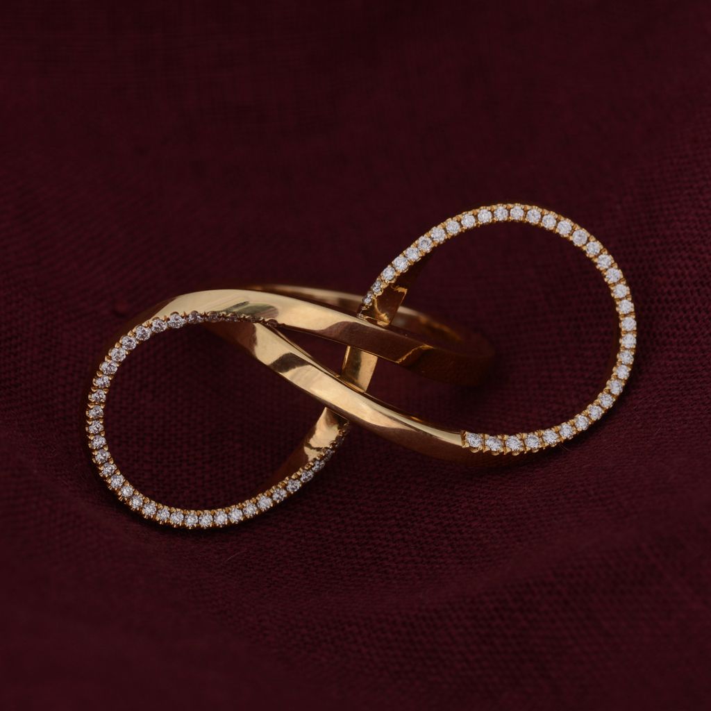 McCaulJewellery's tweet photo. An elegant figure of eight in gold wire is accentuated with a line of pave white diamonds. The sweeping wire loops make this gold and diamond cocktail ring eye-catching yet light and easy to wear.
#infinityring #handforged #jewellerydesign #handcraftedjewellery #paveset https://t.co/IsO4SjoYJQ