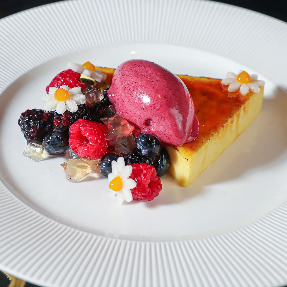 Vanilla bean creme brûlée with mixed berry sorbet and jicama flowers @GTPrimeSteakhouse #BokaRestaurantGroup