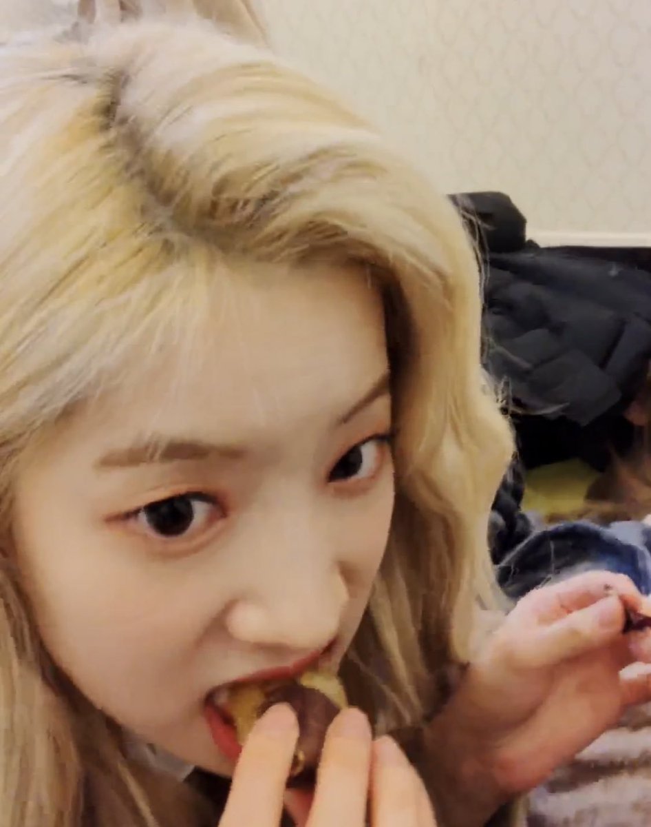 73. Here’s an off photo, Dahyun enjoying her favorites, sweet potato (late again)