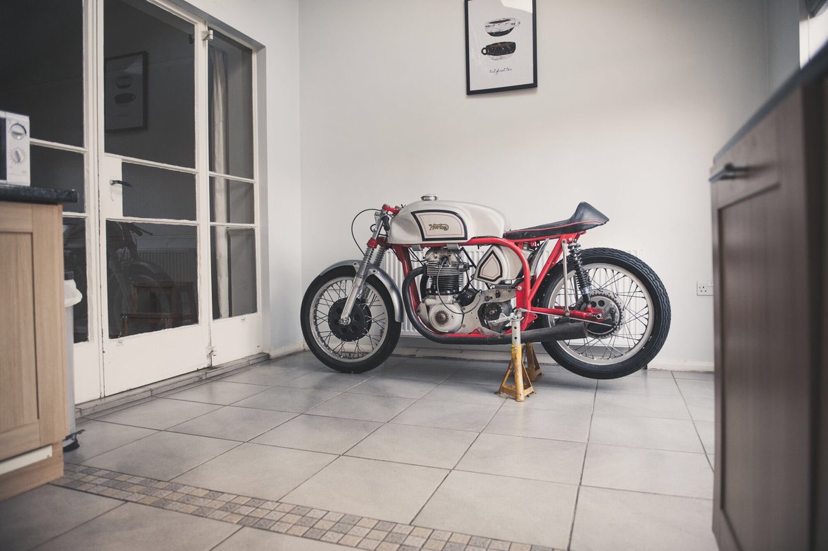BirotarUK's tweet photo. As far as kitchen ornaments go, Jonjos 1957 Norton Dominator is his favourite. #Norton #Racebike #Classic https://t.co/YgbsK1BMMV