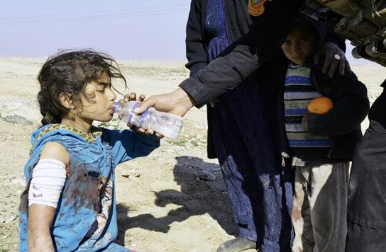 CSOJTF_Central's tweet photo. #ThrowbackFacts ISIS continued to lose physical territory as Iraqi Security Forces & @coalition advisors liberated East Mosul, Iraq on Jan. 25, 2017. The girl in the photo was shot by ISIS & helped by @IraqiCTS; she survived. #DefeatDaesh #ISOF @CENTCOM @CJTFOIR https://t.co/fKoota0Nhc
