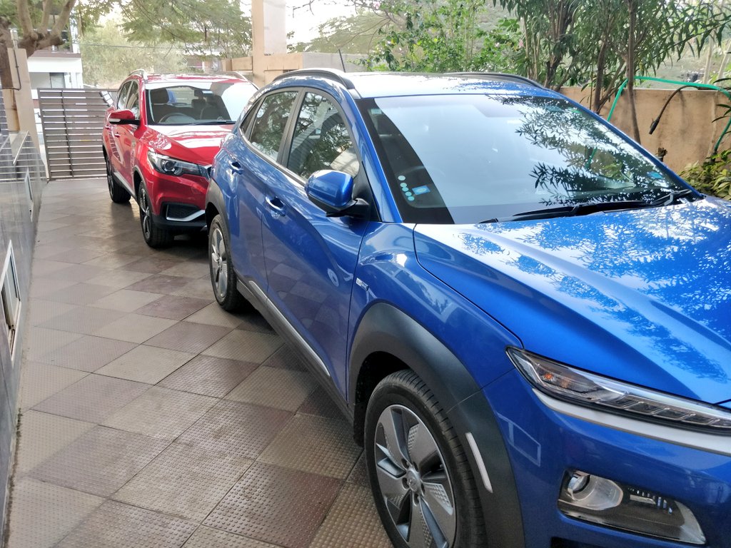 arunbhats's tweet photo. My @HyundaiIndia Kona Electric and my brother's @MGMotorIn ZS EV. #EVsrule . https://t.co/4SwpTlDQtd