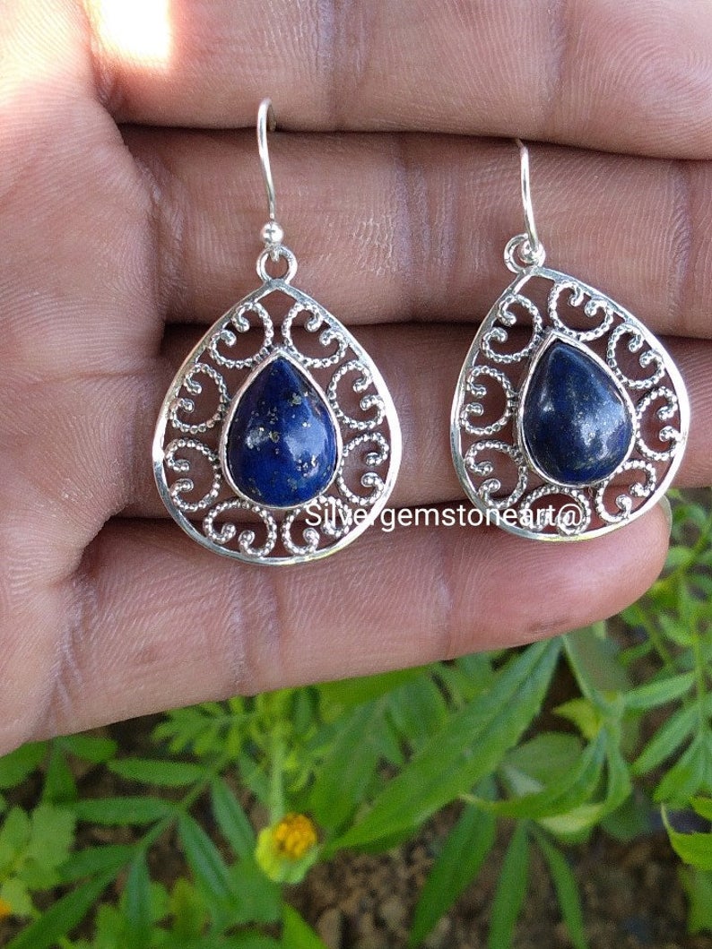 PriyaSh91439018's tweet photo. Natural Lapis Lazuli Ring
Buy At
https://t.co/W50YnL1Mcc

#StatementEarring #BlueColorEarring #VintageEarring #GiftforWomen #EarHookEarring #NaturalLapislazuliEarring #weddingearrings #DelicateEarring #BlueDangleEarring #DesignerEarring #GenuieEarring #SterlingSilverEarring https://t.co/hbq1va7XMc