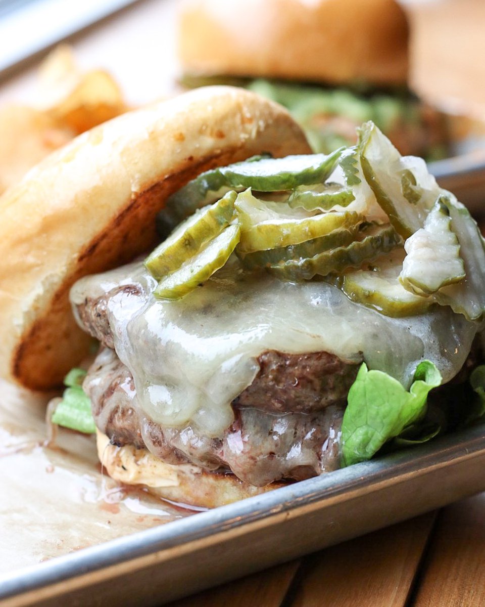 Have you met our newest addition to the menu? Meet the Doubleheader with two 7oz patties, white cheddar, pickles, lettuce, and chef’s sauce. And did we mention you can have it delivered to you for FREE?! 🍔Head to our website to order. #burgersinbed