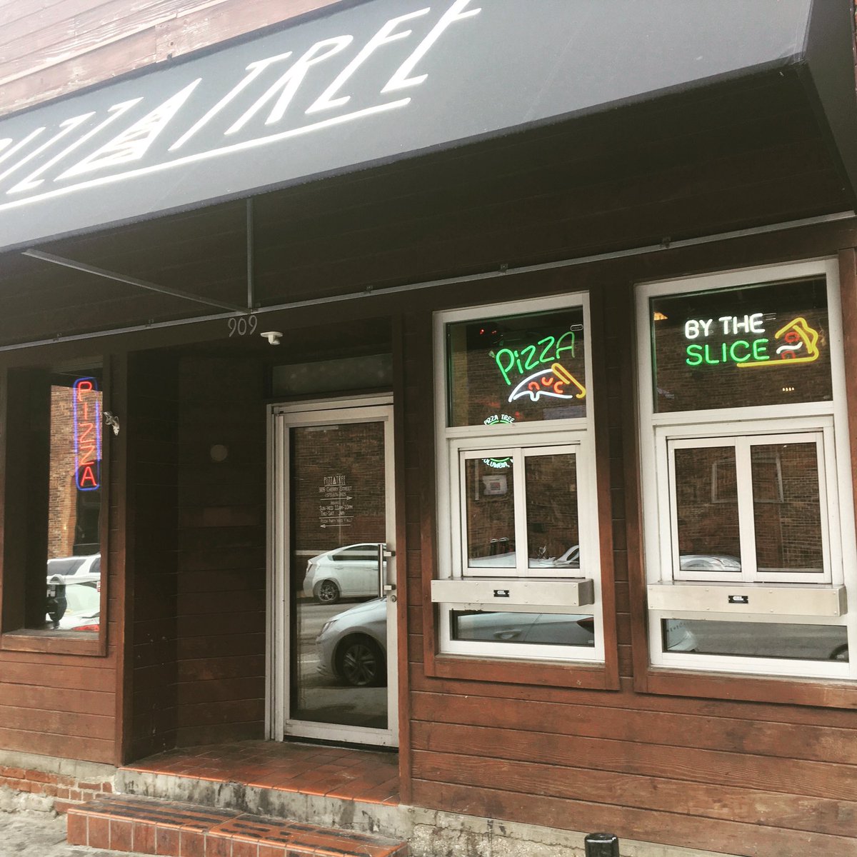 We are open for delivery and pick up/to-go through our slice windows but the dining room is closed to the public to protect our staff and slow the spread. Order online if you can: order.pizzatreepizza.com