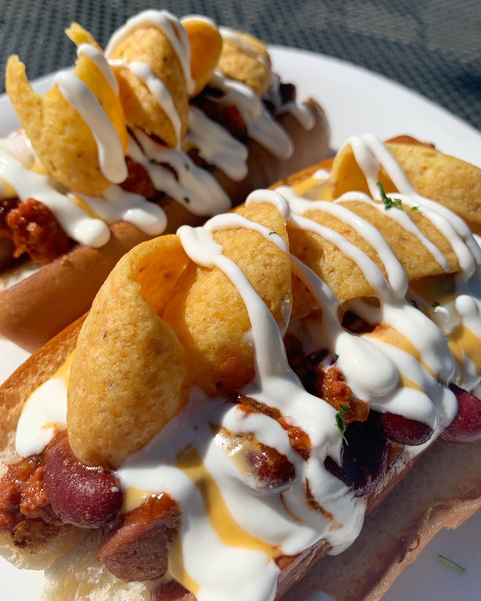 SahmsAleHouse's tweet photo. A couple of this week’s specials. Loaded Chili Cheese Dogs and Polynesian Fried Seitan Wings. https://t.co/rFiMIn7NqP