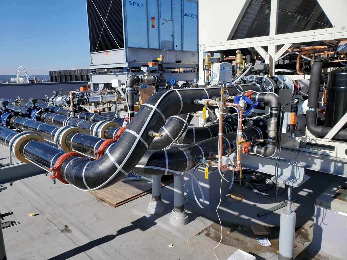 Exterior rooftop piping for ClimaCool 380 ton Air Source Heat Pump.