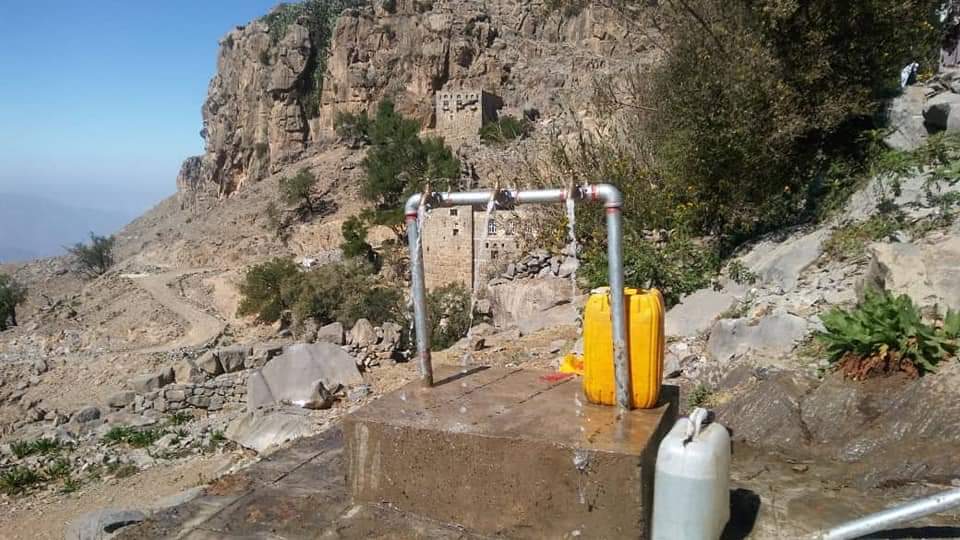 SFDYemen's tweet photo. As villages mount the clouds, movement hardens, chances of aid subside, poverty rises. Fetching water from downhill requires difficult daily trips for #women & children. @SFDYemen provided a public water harvesting tank + work wages, Beit Almharbi, Amran #Yemen
#KfW #GermanGov https://t.co/D4tV4gRu4F