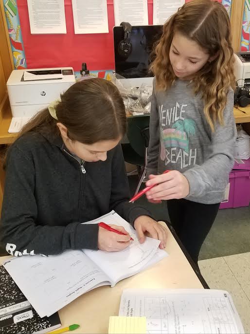 QRSWolfsonClass's tweet photo. Recent scenes from 4W - Sharing and checking homework leads to discussions and learning. #qrspride https://t.co/2mkk4NjQzA