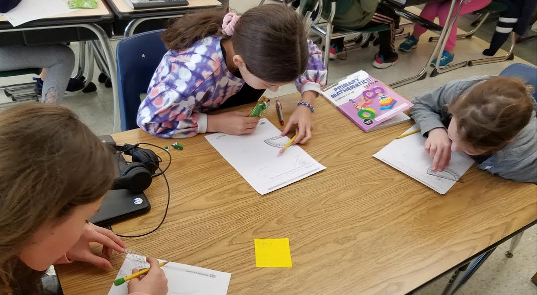 QRSWolfsonClass's tweet photo. Recent scenes from 4W - Practicing measuring angles using protractors - we are being very precise #qrspride https://t.co/RyYsMdaWU5