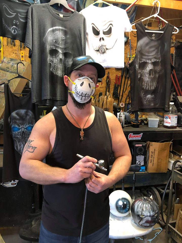 Crazythingart's tweet photo. Corona Virus doesn't scare us! He'll be airbrushing no matter what!! https://t.co/yKoozXBO2j #crazything #coronapocalypse 
#coronavirus #airbrush #artists #UniqueGifts #etsyshop #etsy #skull #customtshirt #mymaskwillprotectme https://t.co/56cZL46vA0