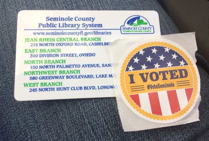 FL4Bernie2020's tweet photo. Andrea and Jason found a rooster hiding in the library bushes as they went to early vote for Bernie in Seminole County, Florida! A relative of Birdie Sanders, perhaps? #Bernie2020 #FloridaForBernie #FLPrimary #EarlyVotingWeekend 🐦 https://t.co/ACgStUuCO5