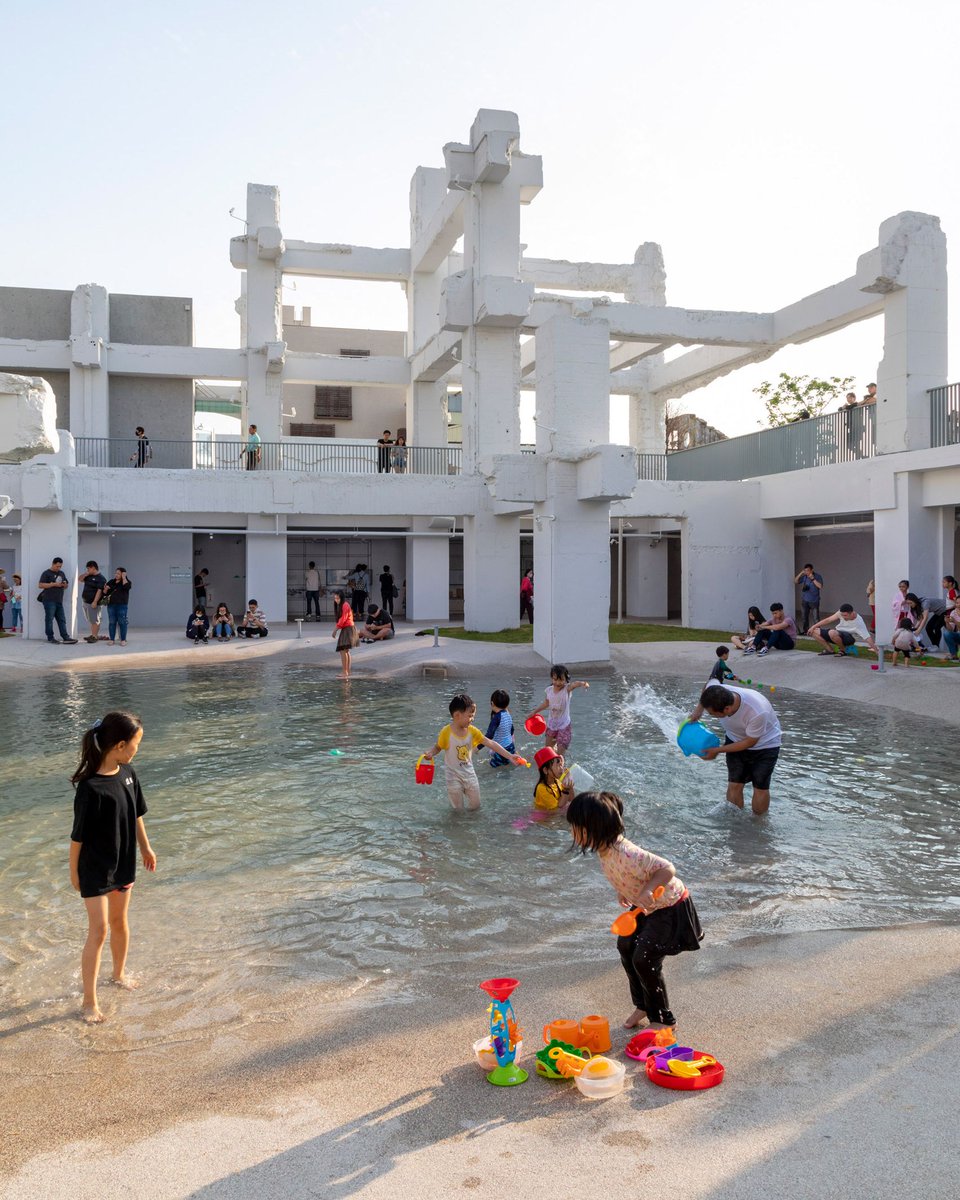 dezeen's tweet photo. .@MVRDV has transformed an old Taiwanese shopping centre into a "lush lagoon": https://t.co/8w4DnFkX3L https://t.co/8LFe8P1WgX